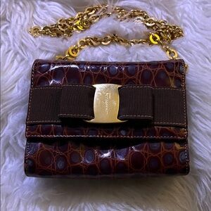 🔥 Ferragamo Crocodile Pattern Bag with gold hardware.